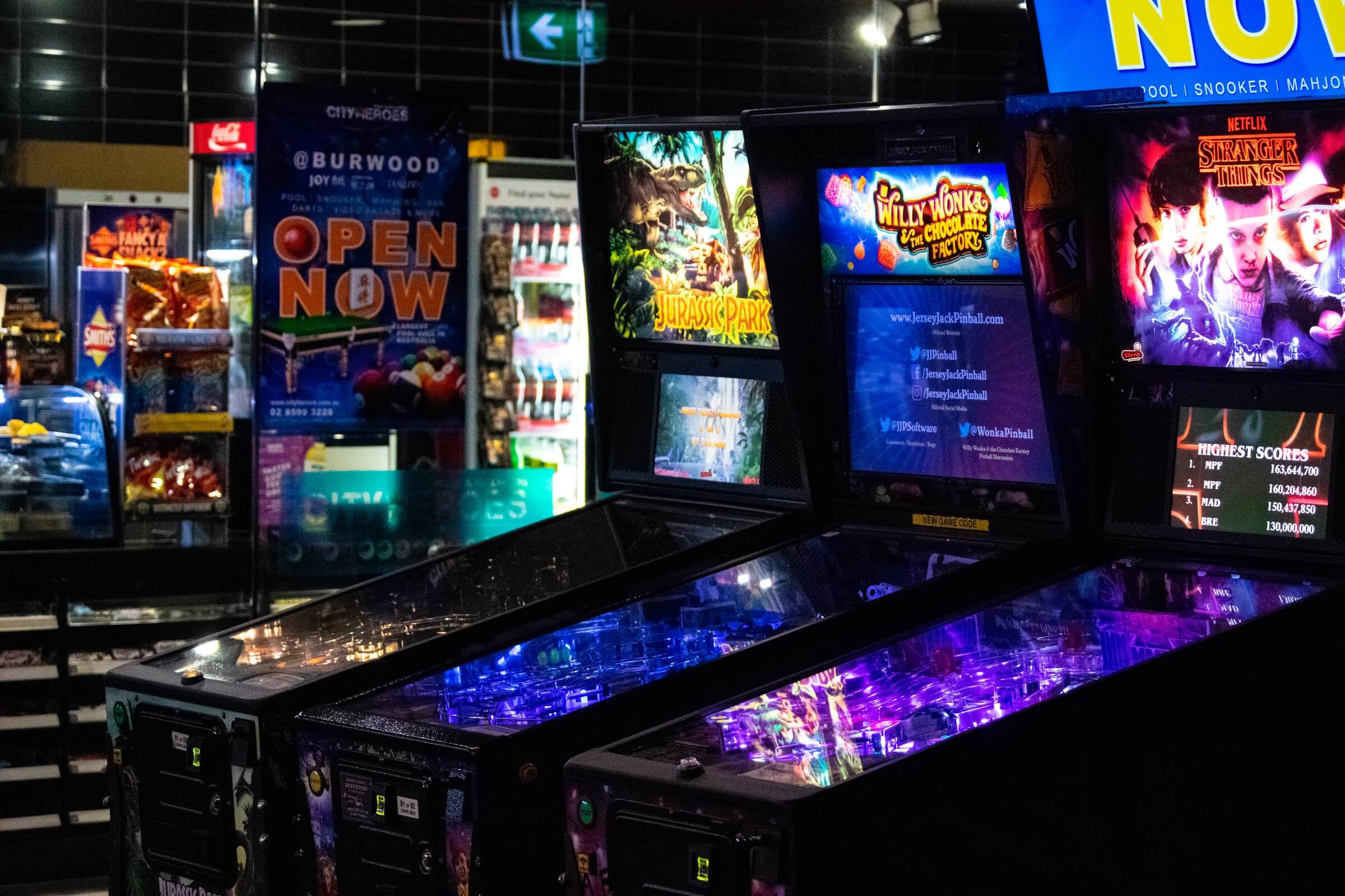 arcade game machine turned on in a room